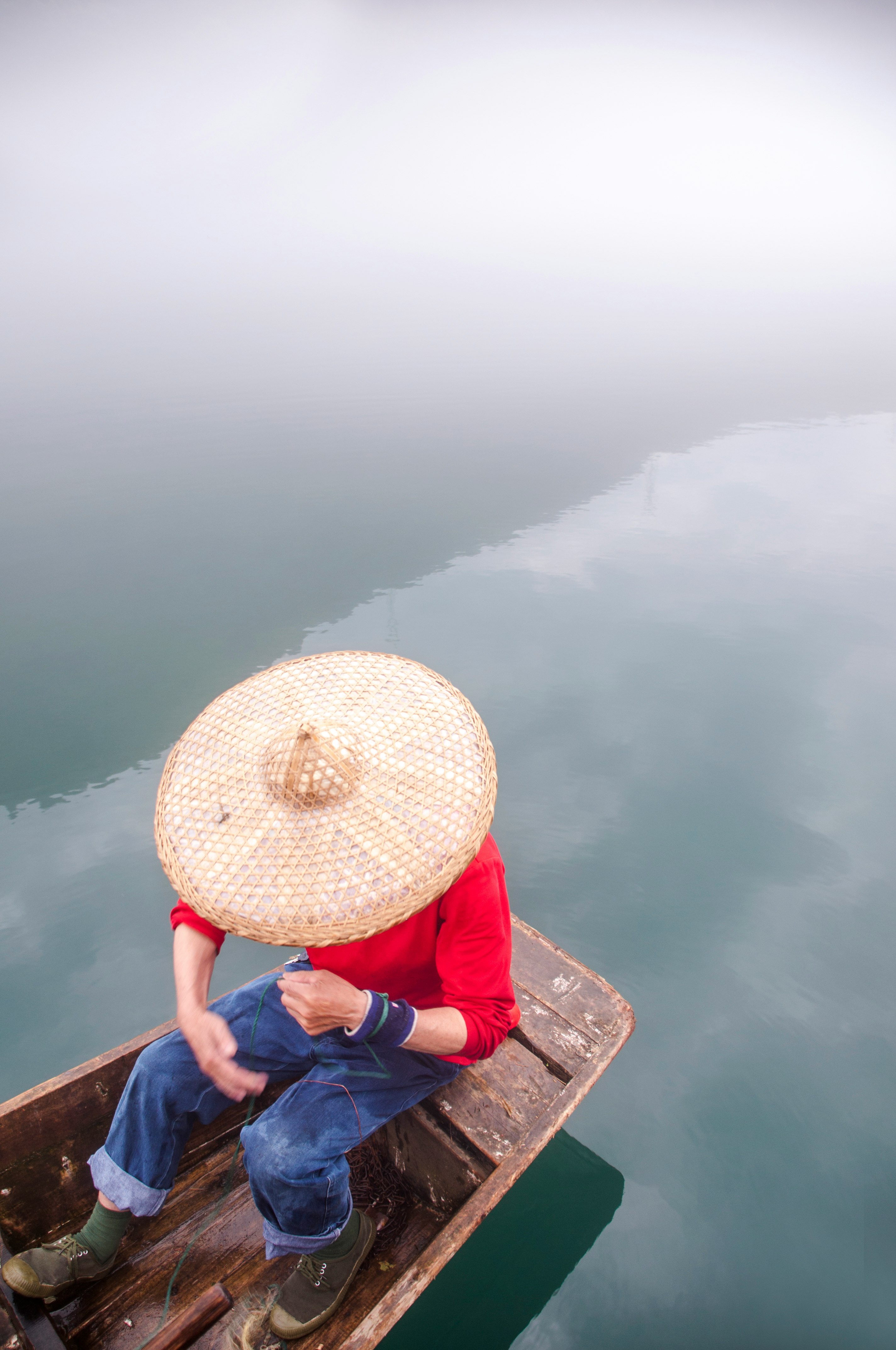 man riding boat